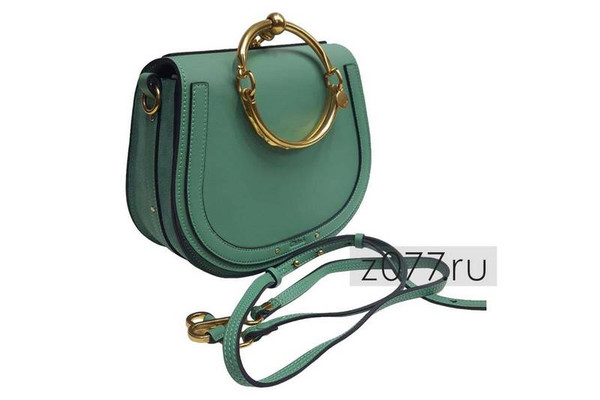 женская сумка зеленого цвета